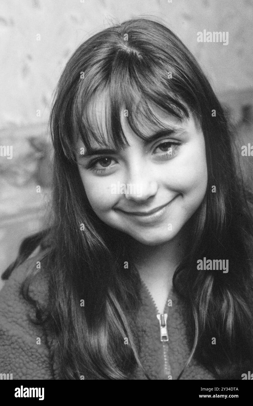 CHARLOTTE CHURCH, CHILD STAR, PORTRAIT, 1998: A very early portrait of 12-year-old Charlotte Church just after the release of her debut 'Voice Of An Angel' album at her Welsh childhood home in Gabalfa, Cardiff, Wales, UK on 16 November 1998. Photo: Rob Watkins. INFO: Charlotte Church, a Welsh singer and actress, achieved fame as a classical crossover artist in her youth. Known for her angelic voice, she transitioned to pop and released albums like 'Tissues and Issues,' showcasing her versatility. Church's career spans music, TV, and film, reflecting her diverse talents. Stock Photo