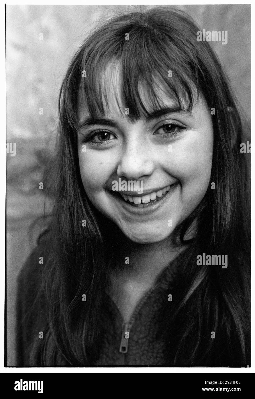 CHARLOTTE CHURCH, CHILD STAR, PORTRAIT, 1998: A very early portrait of 12-year-old Charlotte Church just after the release of her debut 'Voice Of An Angel' album at her Welsh childhood home in Gabalfa, Cardiff, Wales, UK on 16 November 1998. Photo: Rob Watkins. INFO: Charlotte Church, a Welsh singer and actress, achieved fame as a classical crossover artist in her youth. Known for her angelic voice, she transitioned to pop and released albums like 'Tissues and Issues,' showcasing her versatility. Church's career spans music, TV, and film, reflecting her diverse talents. Stock Photo