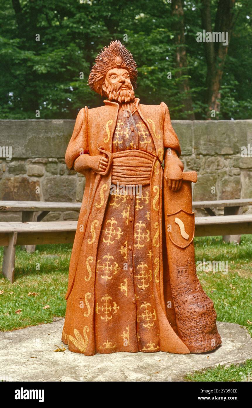 Sculpture of nobleman, Drużyna arms, at courtyard of Nowy Wisnicz Castle, in village of Stary Wisnicz, Malopolska region, Poland Stock Photo