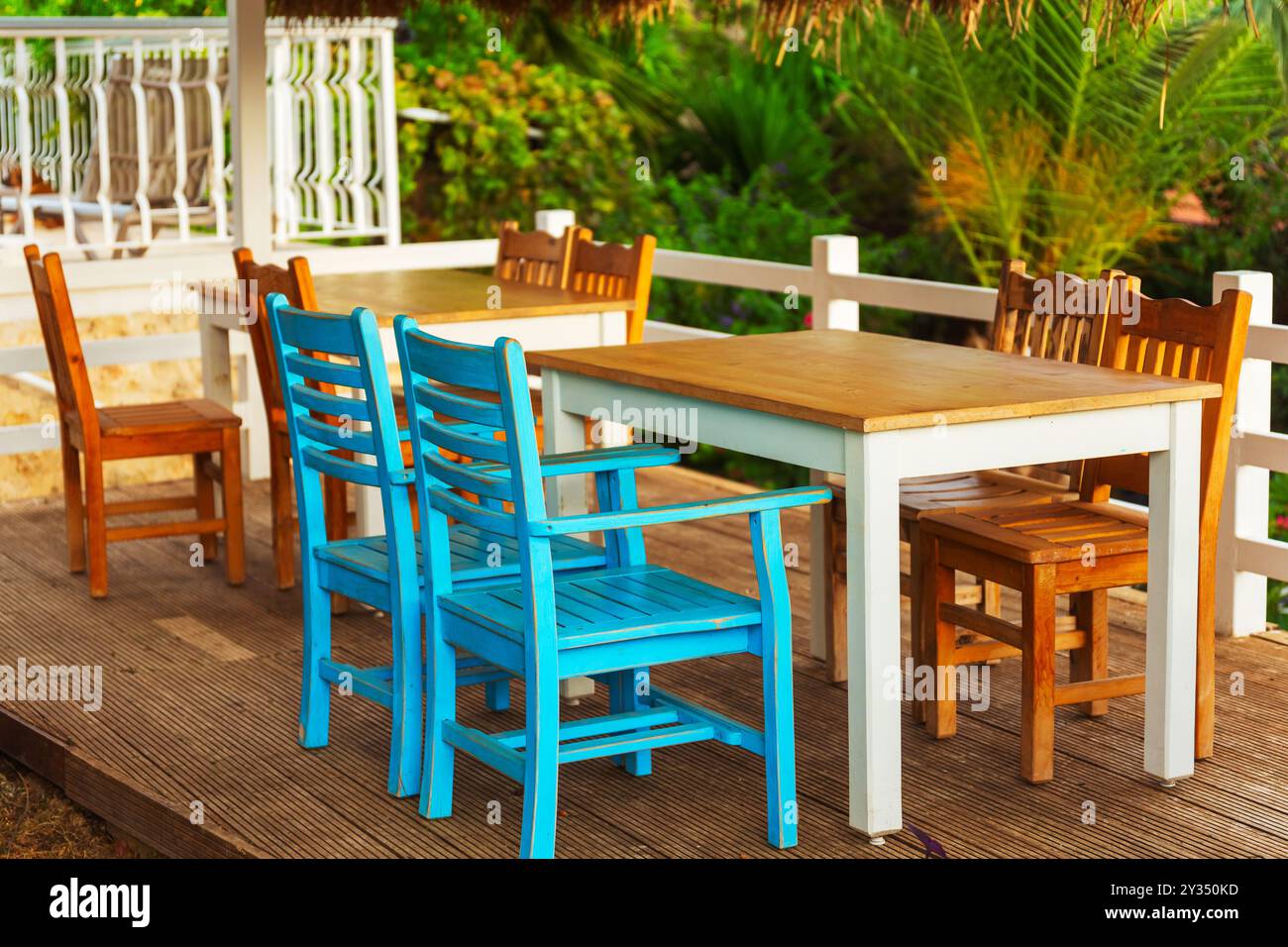 Modern wooden deck chairs hi-res stock photography and images - Alamy