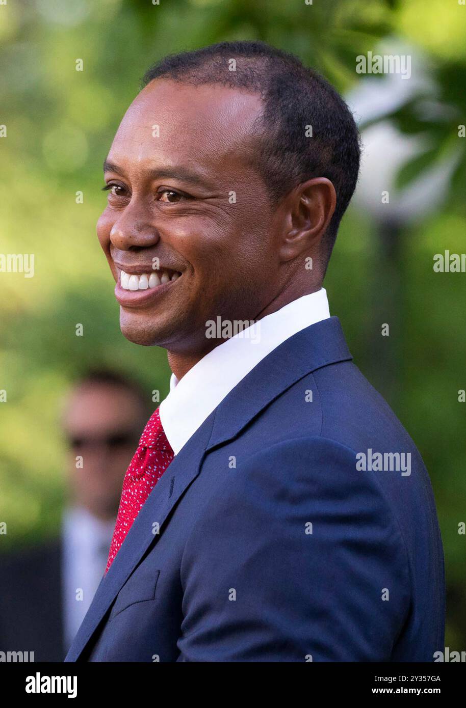 President Donald J. Trump presents the Presidential Medal of Freedom to Tiger Woods May 6, 2019, in the Rose Garden of the White House. (Official White House Photo by Joyce N. Boghosian) Stock Photo
