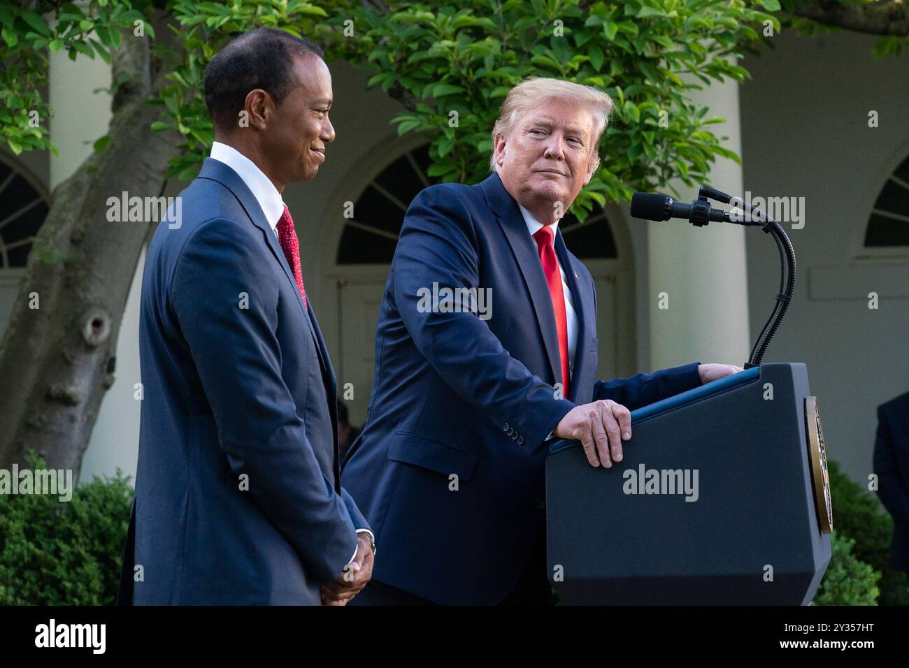 President Donald J. Trump welcomes Tiger Woods, his family and guests Monday, May 6, 2019, to the Rose Garden of the White House, prior to Woods receiving the Presidential Medal of Freedom. (Official White House Photo by Andrea Hanks) Stock Photo