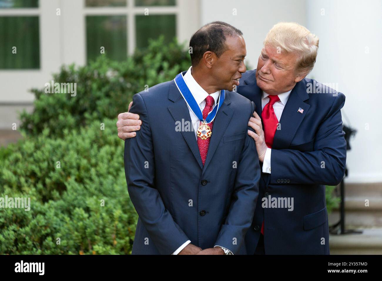 US President Donald J. Trump presents the Presidential Medal of Freedom to Tiger Woods May 6, 2019, in the Rose Garden of the White House. (Official White House Photo Shealah Craighead) Stock Photo