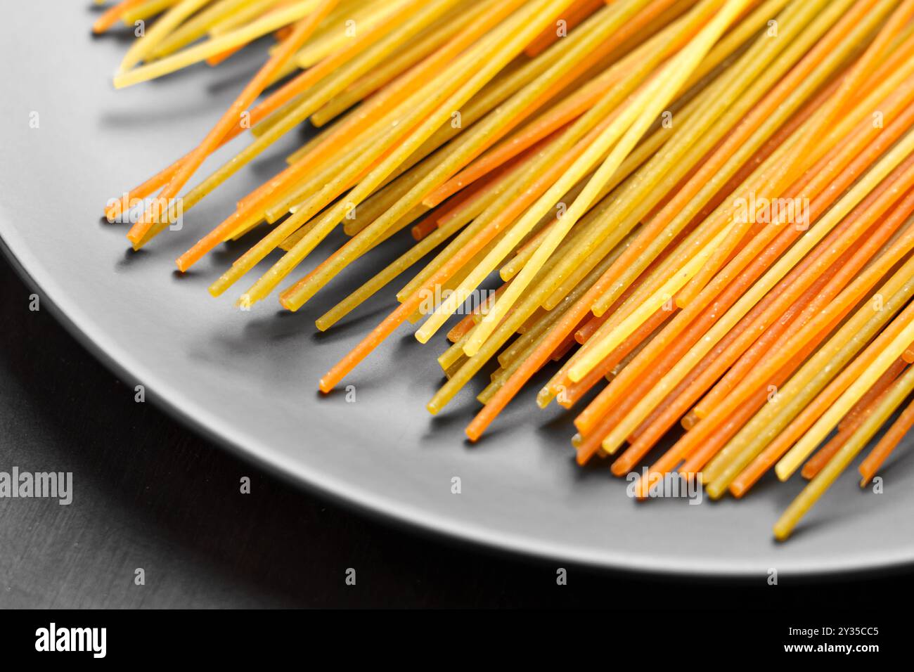 Image showcasing Artisanal organic spaghetti pasta with mix of colors and textures in ...