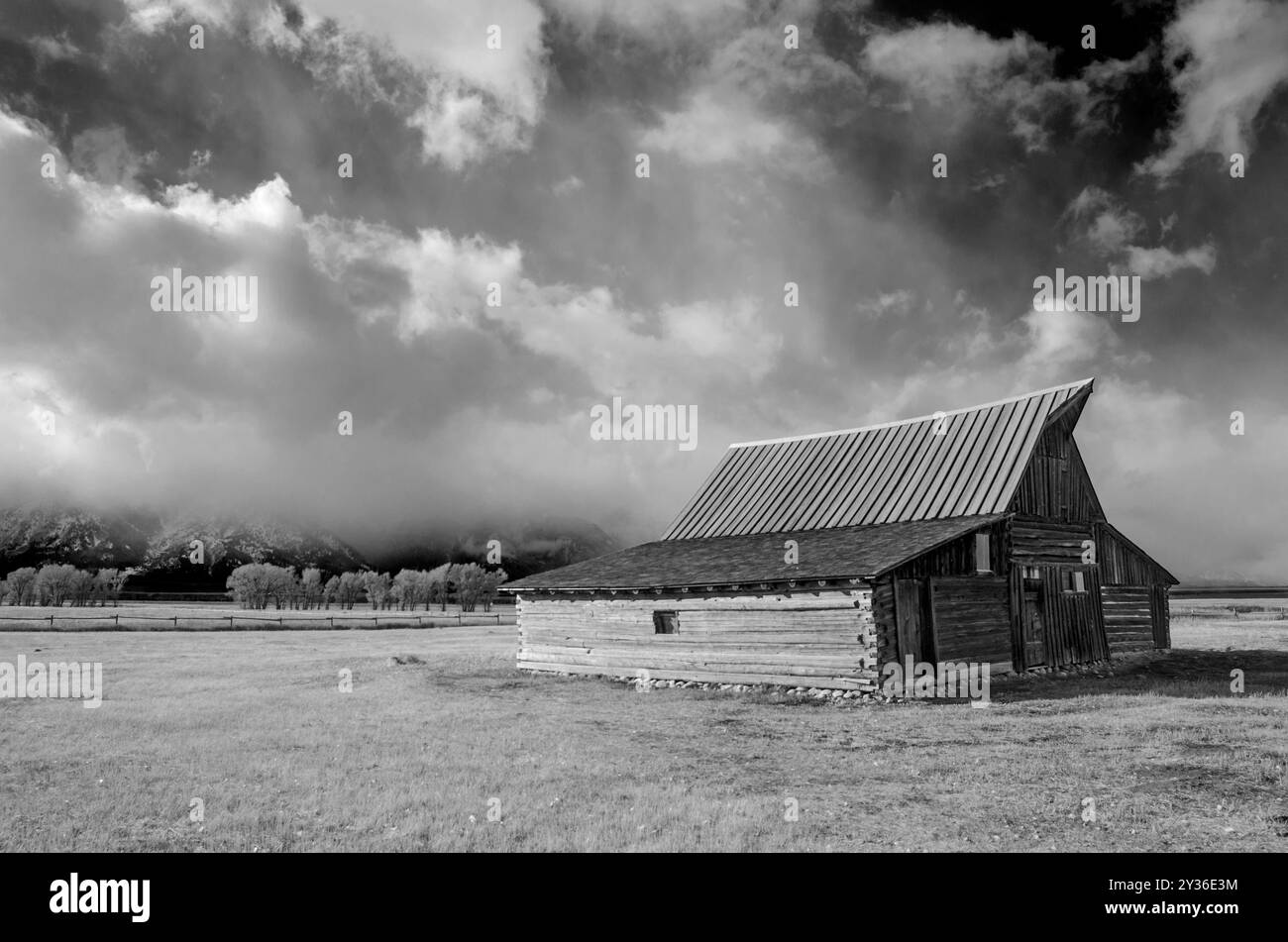 Mormon Row Historic District at the Teton Range of Grand Teton National Park in the U.S. state of Wyoming Stock Photo