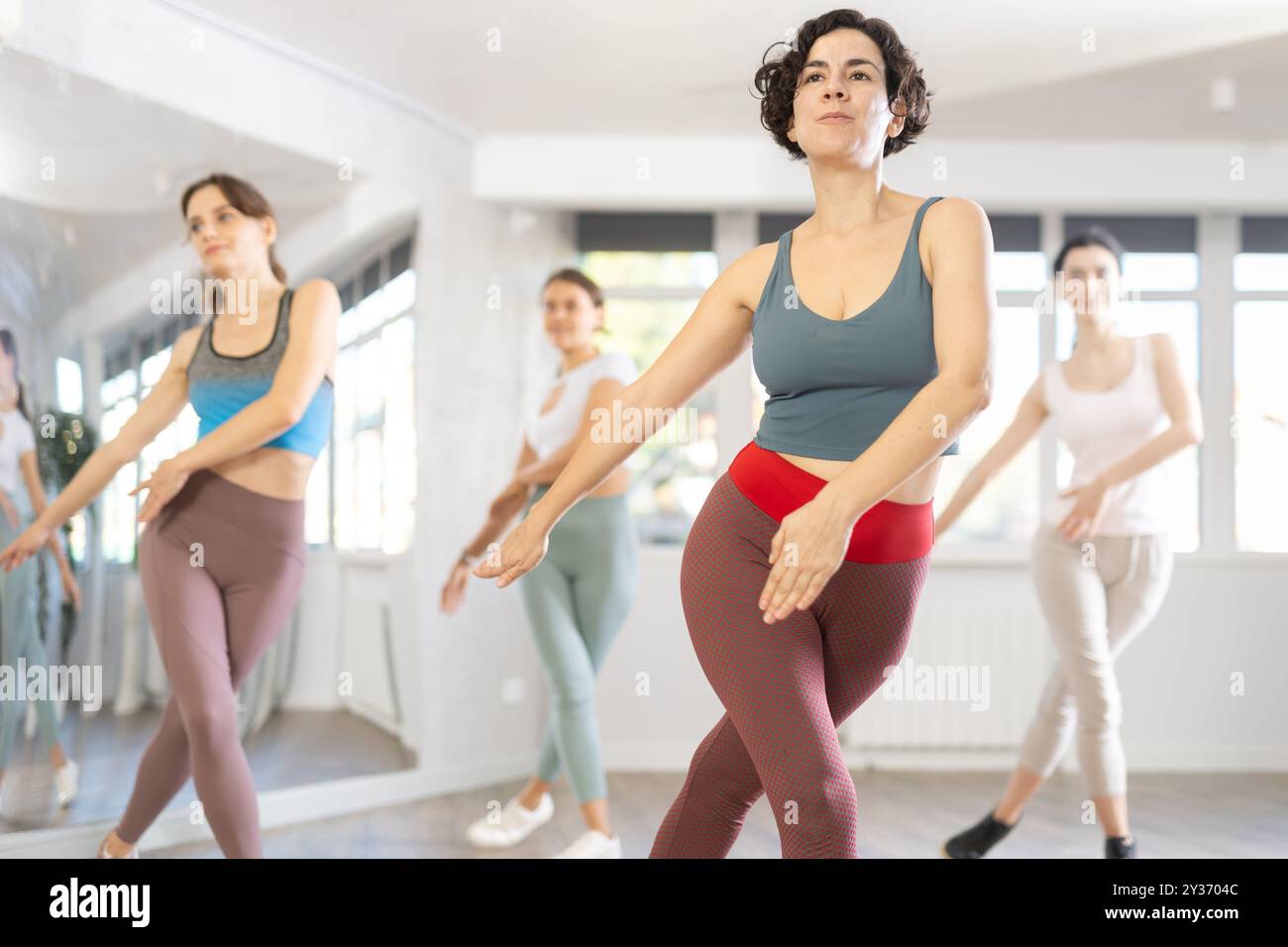 Funk jazz dancers practicing dance moves in studio Stock Photo