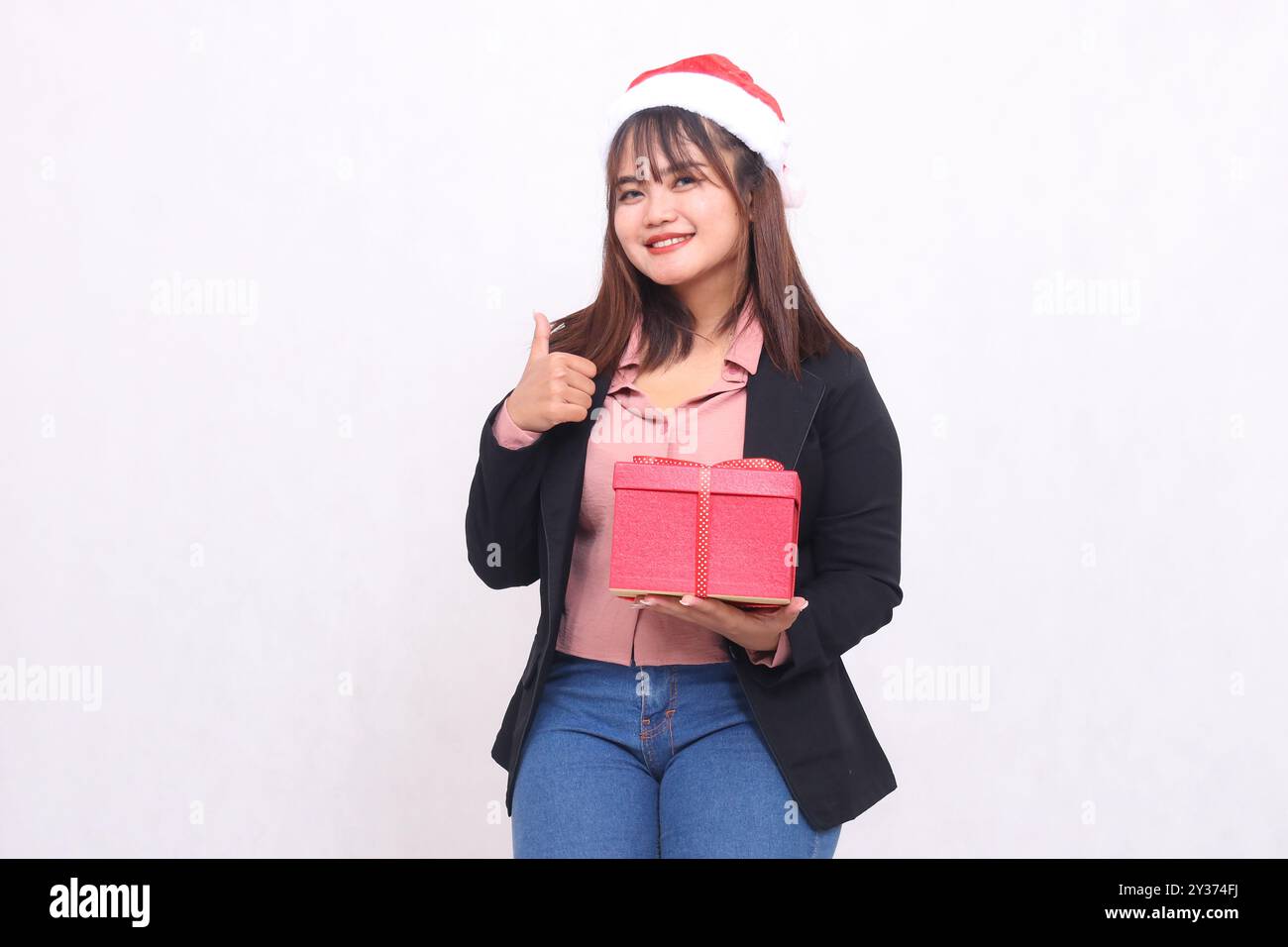 Happy female signing agreement hi-res stock photography and images - Alamy