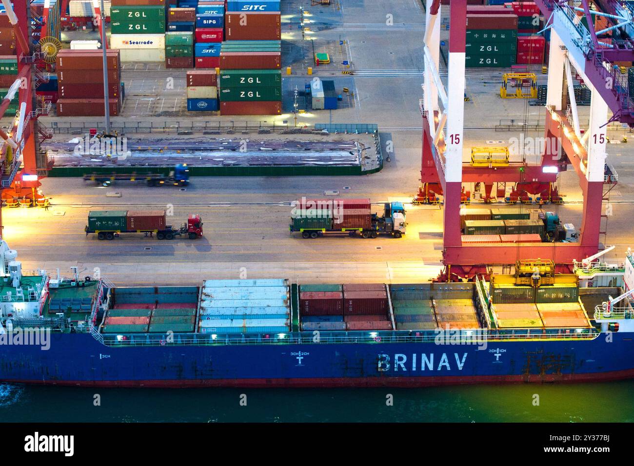QINGDAO, CHINA - SEPTEMBER 12, 2024 - Container ships load and unload ...