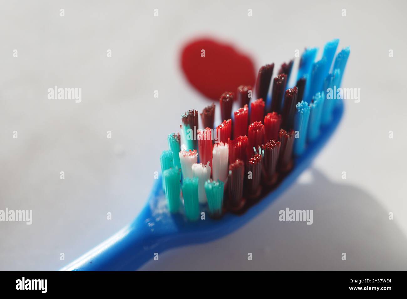 Toothbrush with blood hi-res stock photography and images - Alamy
