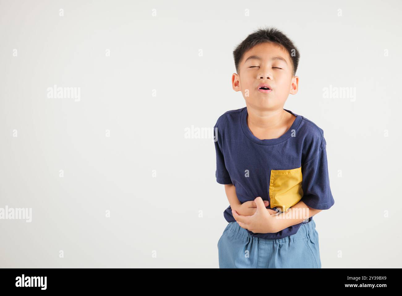 portrait-of-asian-young-kid-boy-has-stomachache-primary-child