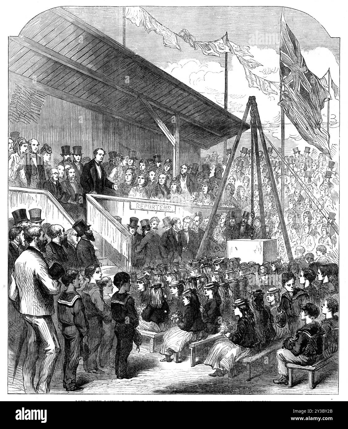 Lord Derby laying the first stone of the Seamen Orphan Institution, [at Newsham Park,] Liverpool, 1871. 'The estimated cost of the new institution, which will accommodate 200 boys and 100 girls, is about &#xa3;30,000...Mr. Alfred Waterhouse is the architect, and Messrs. Haigh and Co. are the contractors...the Earl of Derby made a speech, in which he spoke of the different classes by whose exertions Liverpool had been made the first seaport in the world, especially the seamen of the mercantile marine: &quot;Of all labour there is none to which we are more indebted, or in regard to which we ough Stock Photo