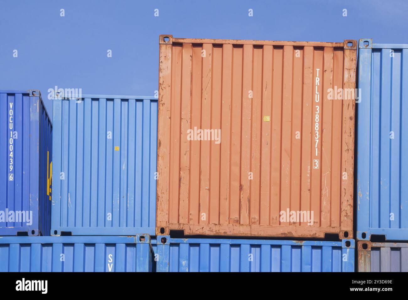 Stacked colourful freight containers at the container terminal in Holz ...