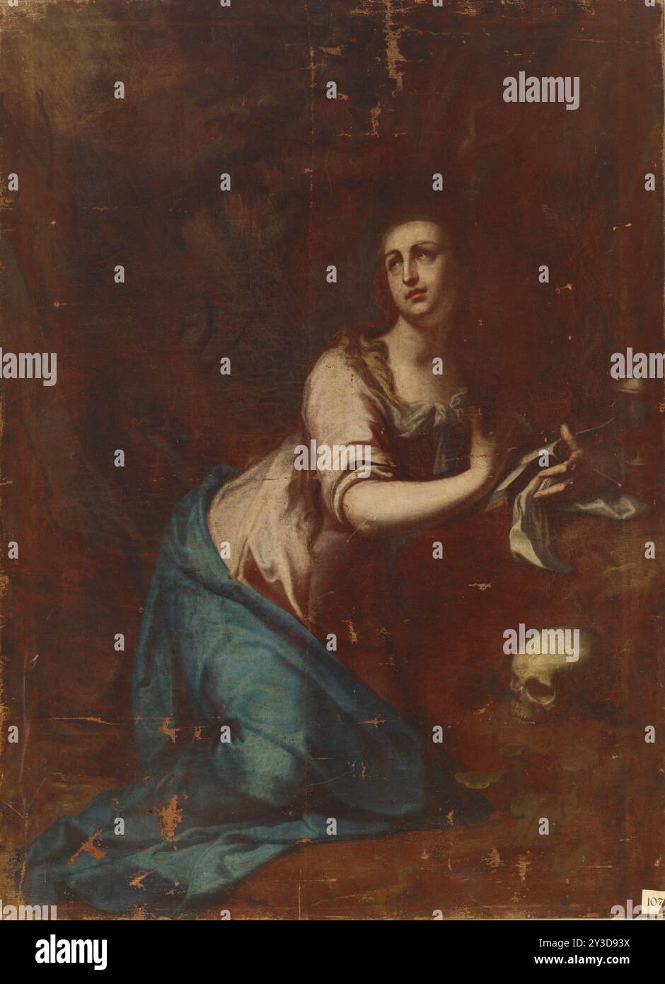 Mary Magdalene. Maria Magdalena sitting in a cave. Her hand rests