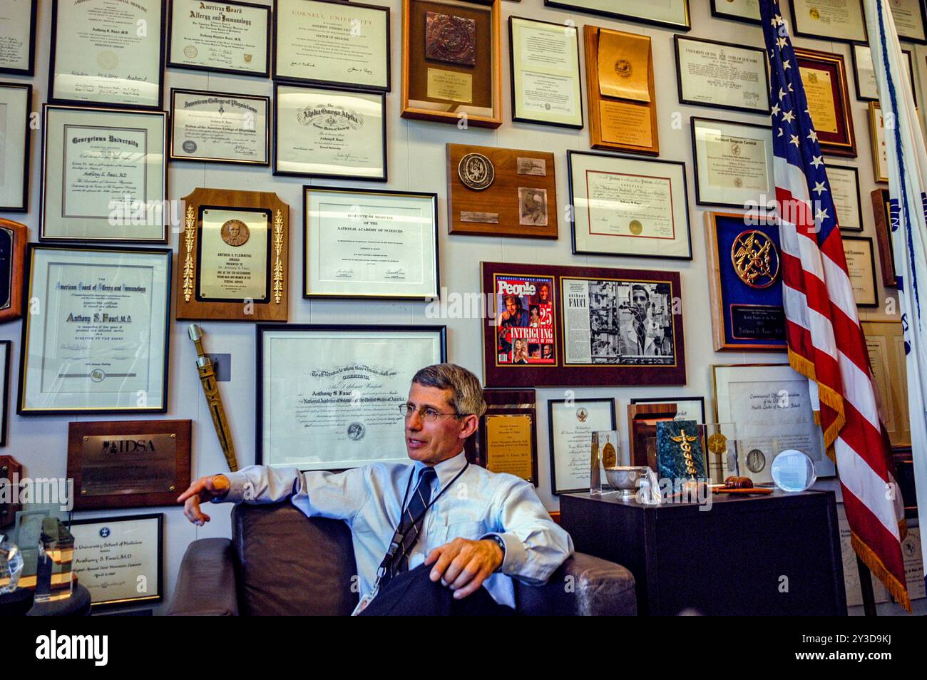 Anthony Fauci, MD, Director of the National Institute of Allergy and Infectious Diseases of the National Institutes of Health (NIH), seated in his office, Bethesda, Maryland, 2003. Photo by  Michael Geissinger Stock Photo