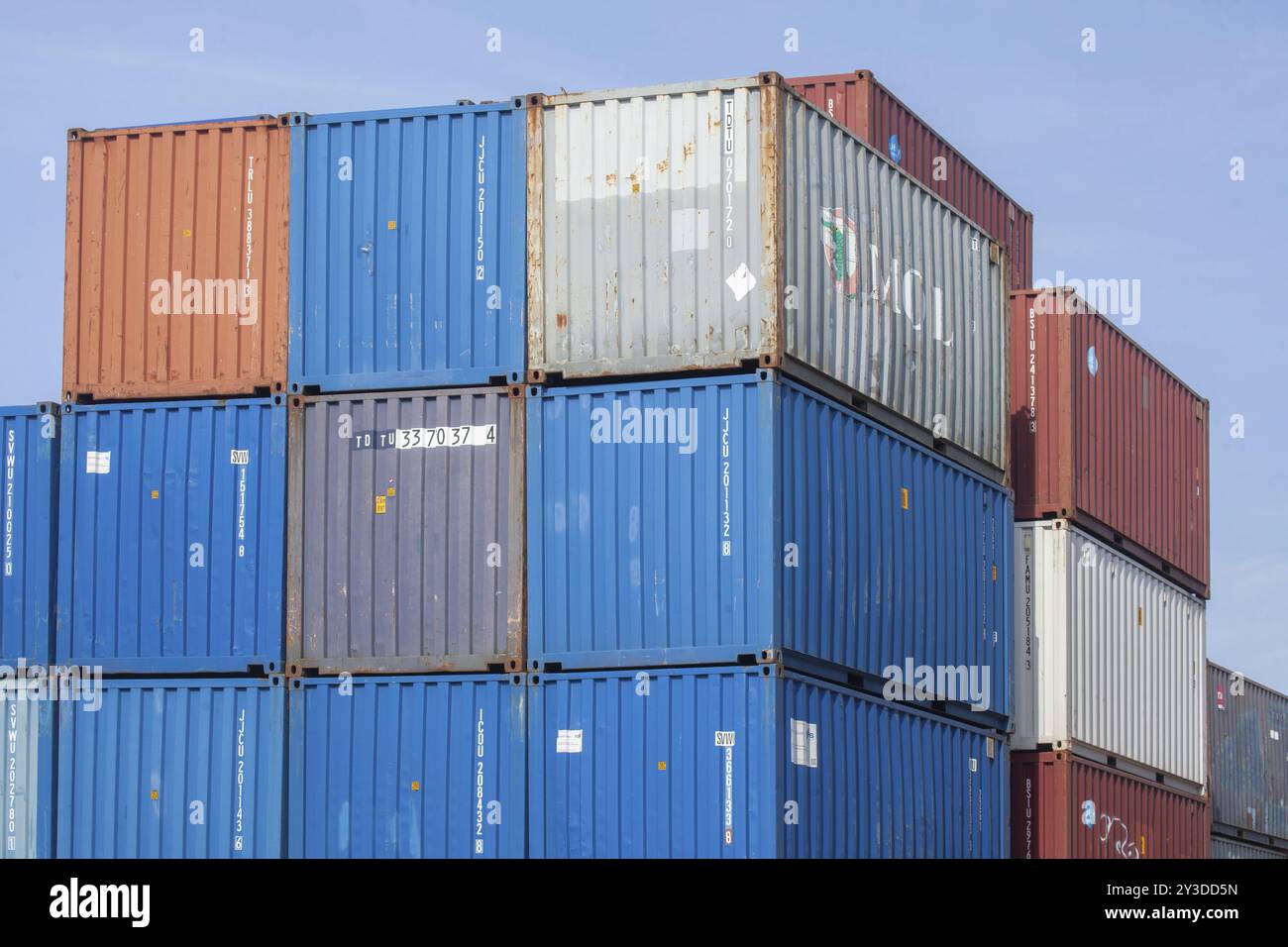 Stacked colourful freight containers at the container terminal in Holz ...
