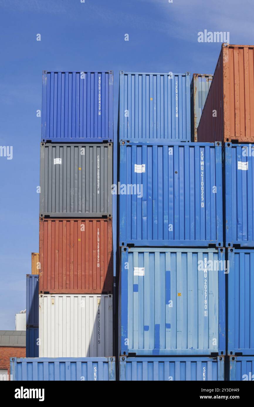 Stacked colourful freight containers at the container terminal in Holz ...