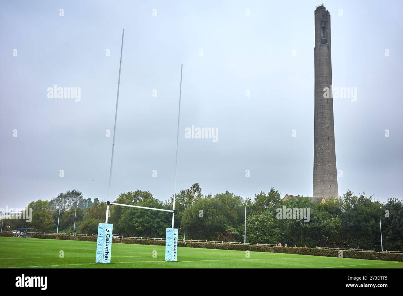 Nation Lift Tower (former Express lift testing tower) by Northampton Saints rugby football club (rfc) training pitch, England. Stock Photo