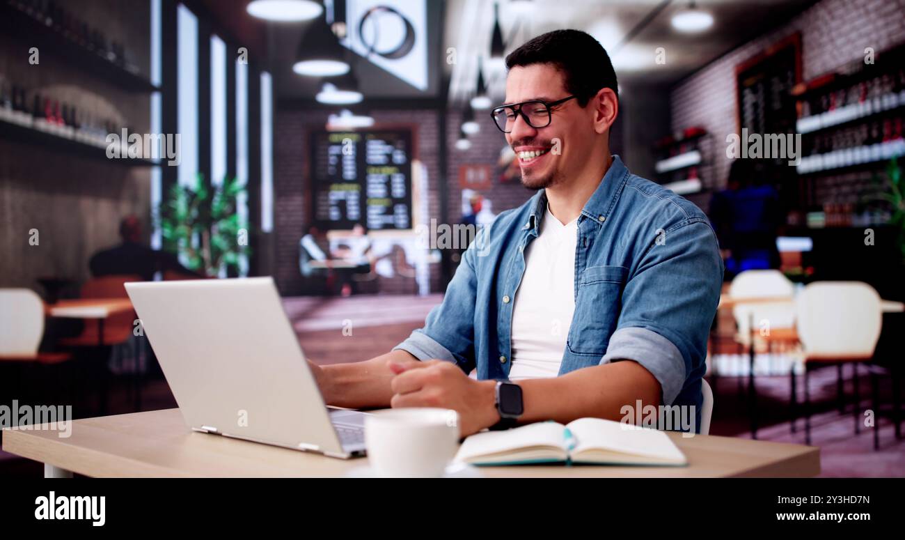 Excited Business Analyst Using Laptop Computer And Celebrating Win Stock Photo