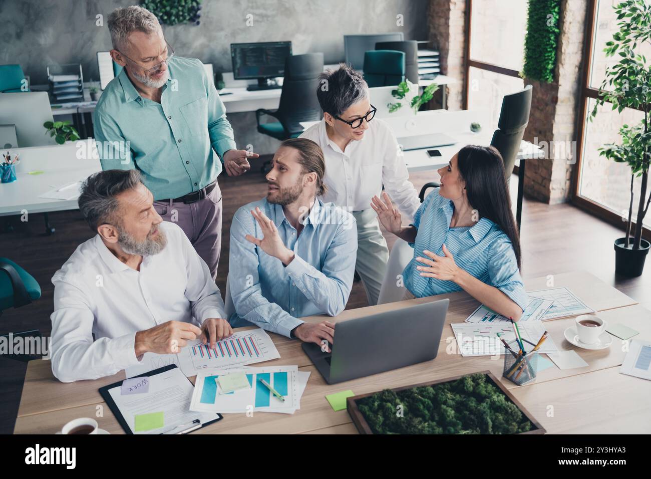 Photo of five successful corporate colleagues chatting project ...