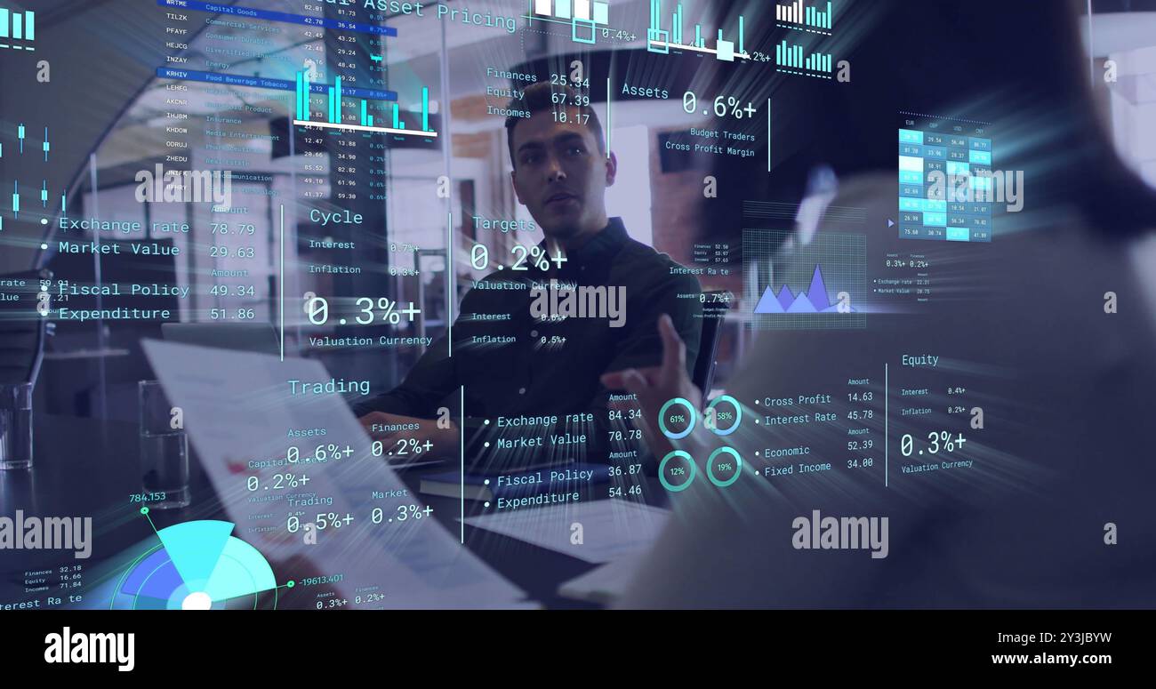 Work Image Data Image of diagrams and data processing over diverse colleagues ...