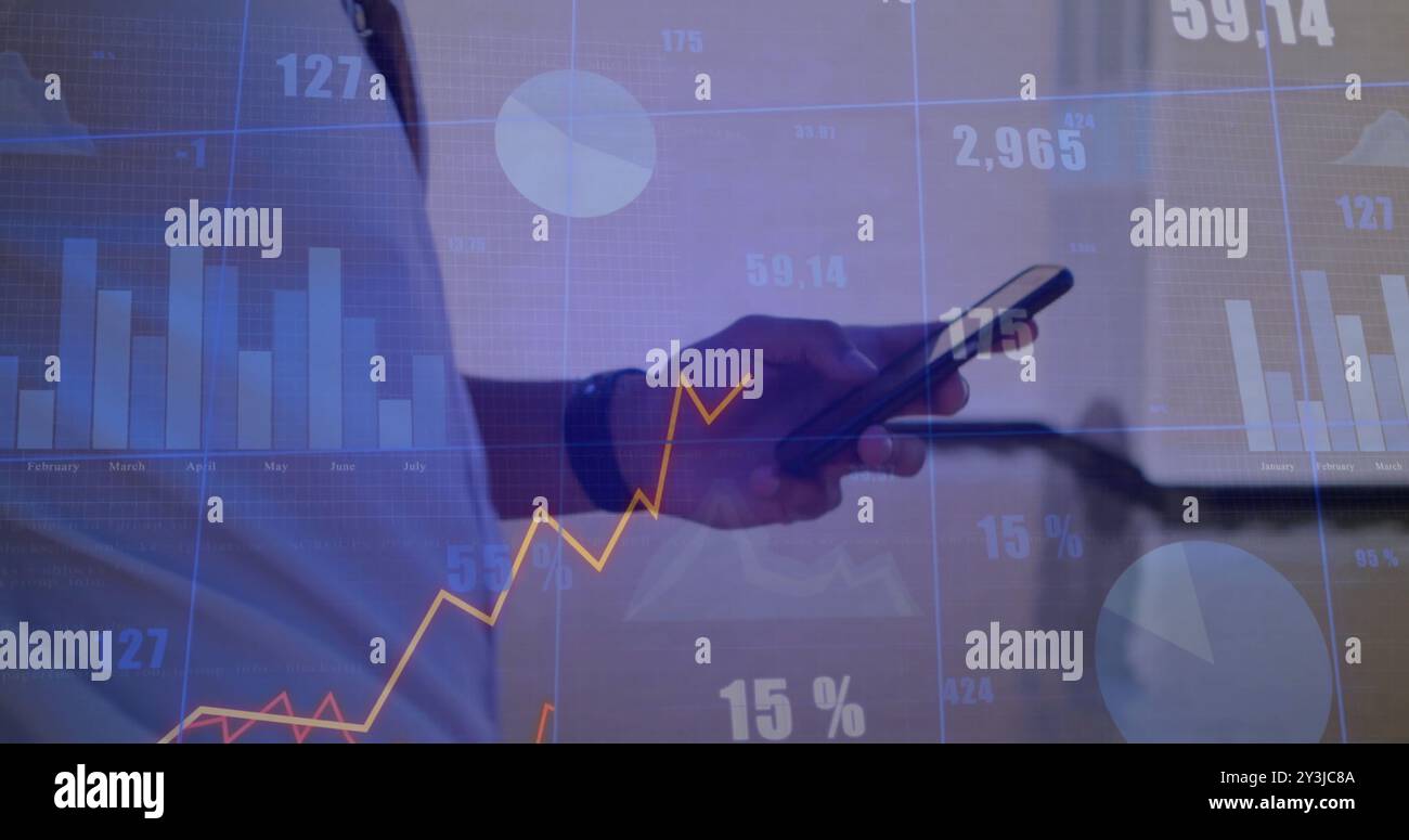 Image of data processing and diagrams over biracial man using smartphone Stock Photo