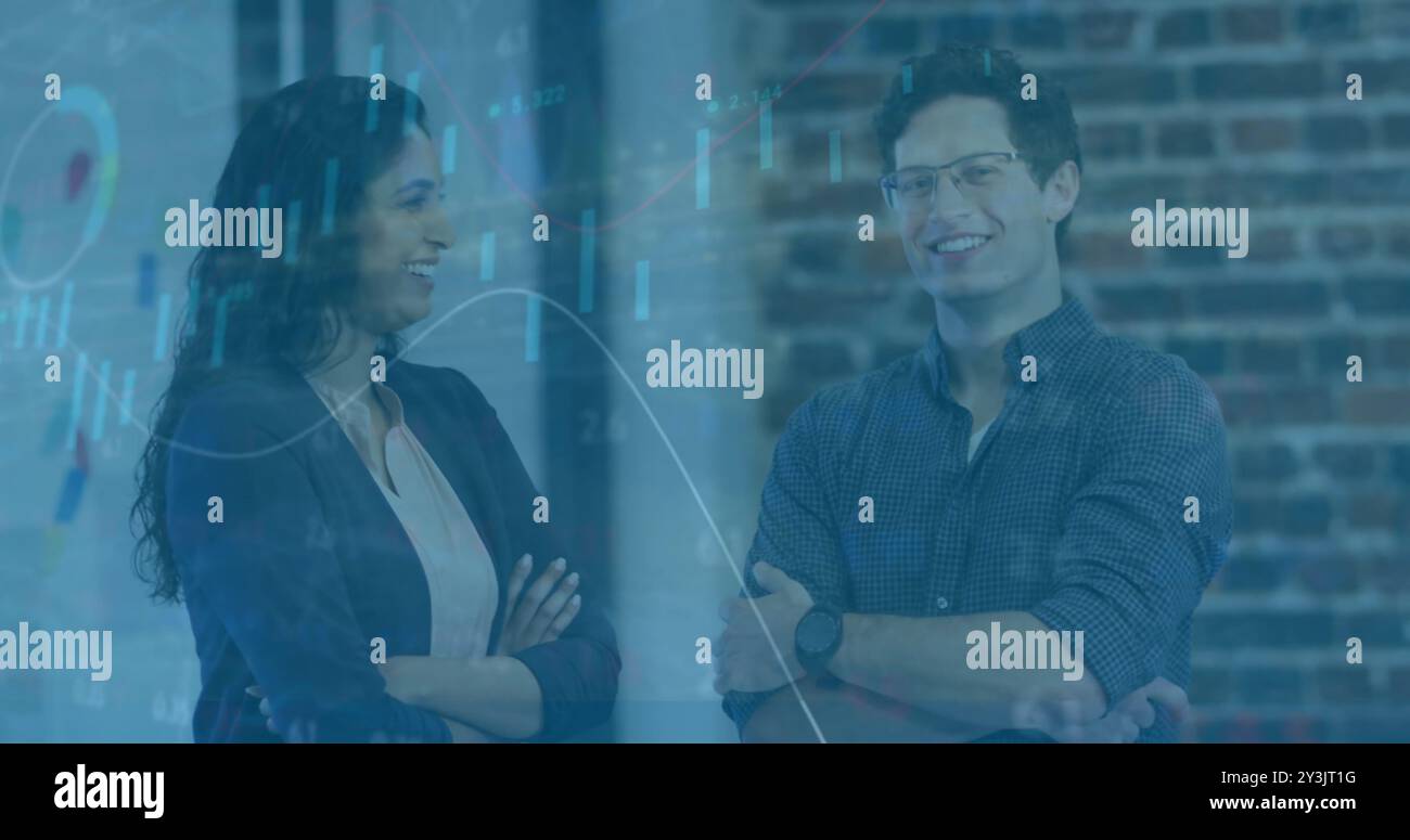 Business data analytics image over smiling colleagues in office Stock Photo