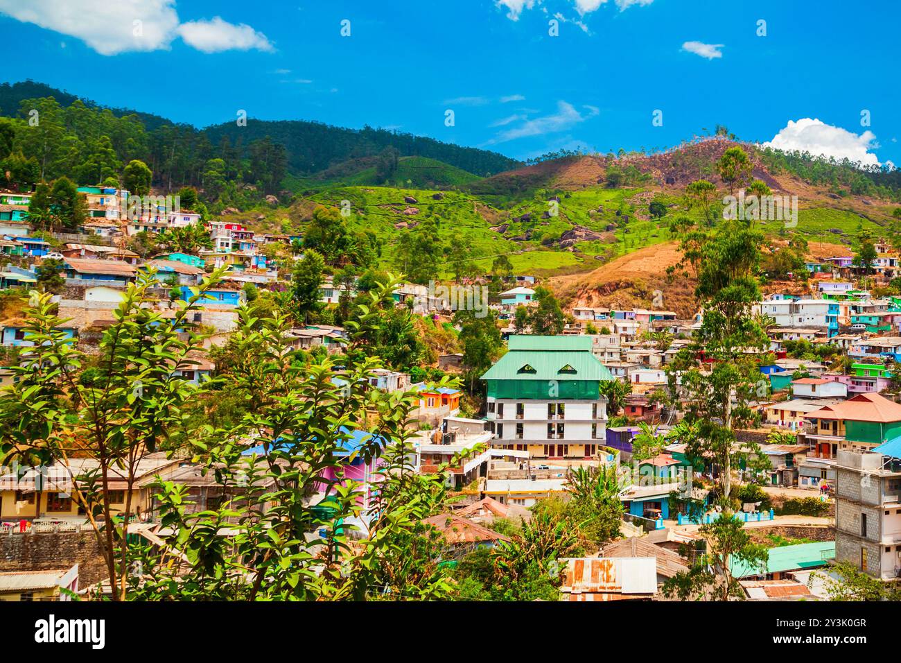 Landscape of Munnar town, surrounded with tea plantation in India Stock Photo