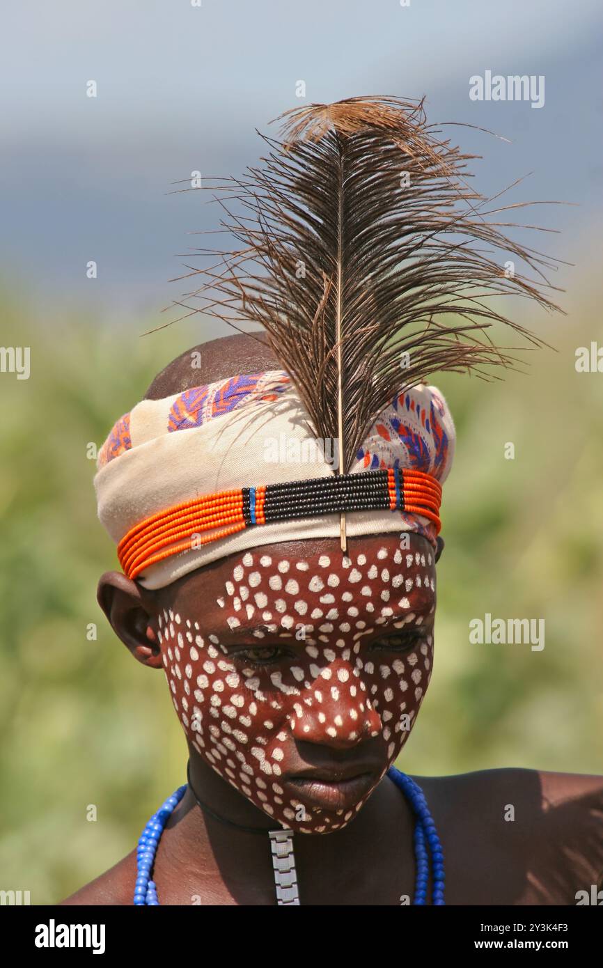 Ethiopian Arbore boy in tradition headdress and face painting Stock Photo