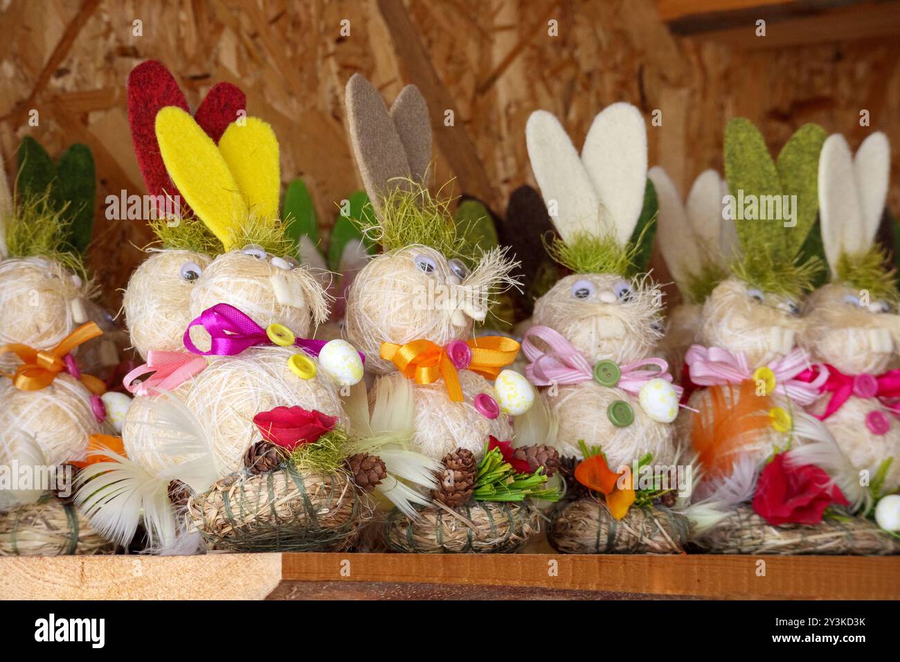 A gorgeous Easter bunny and eggs are made from straw Stock Photo