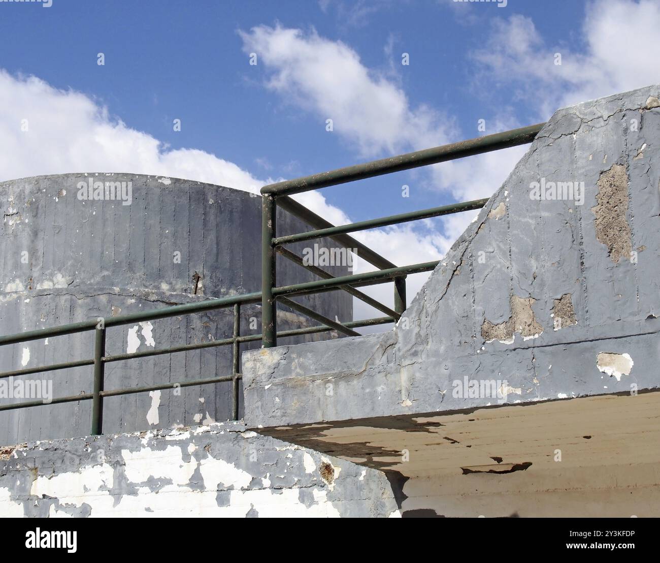An old crumbling concrete military bunker type structure with rounded ...