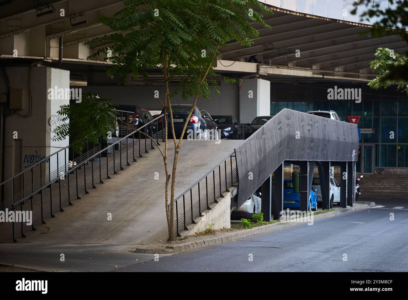 Bucharest, Romania - September 04, 2024: Multi-level parking on the metal structure in the free space under Basarab Overpass. Stock Photo