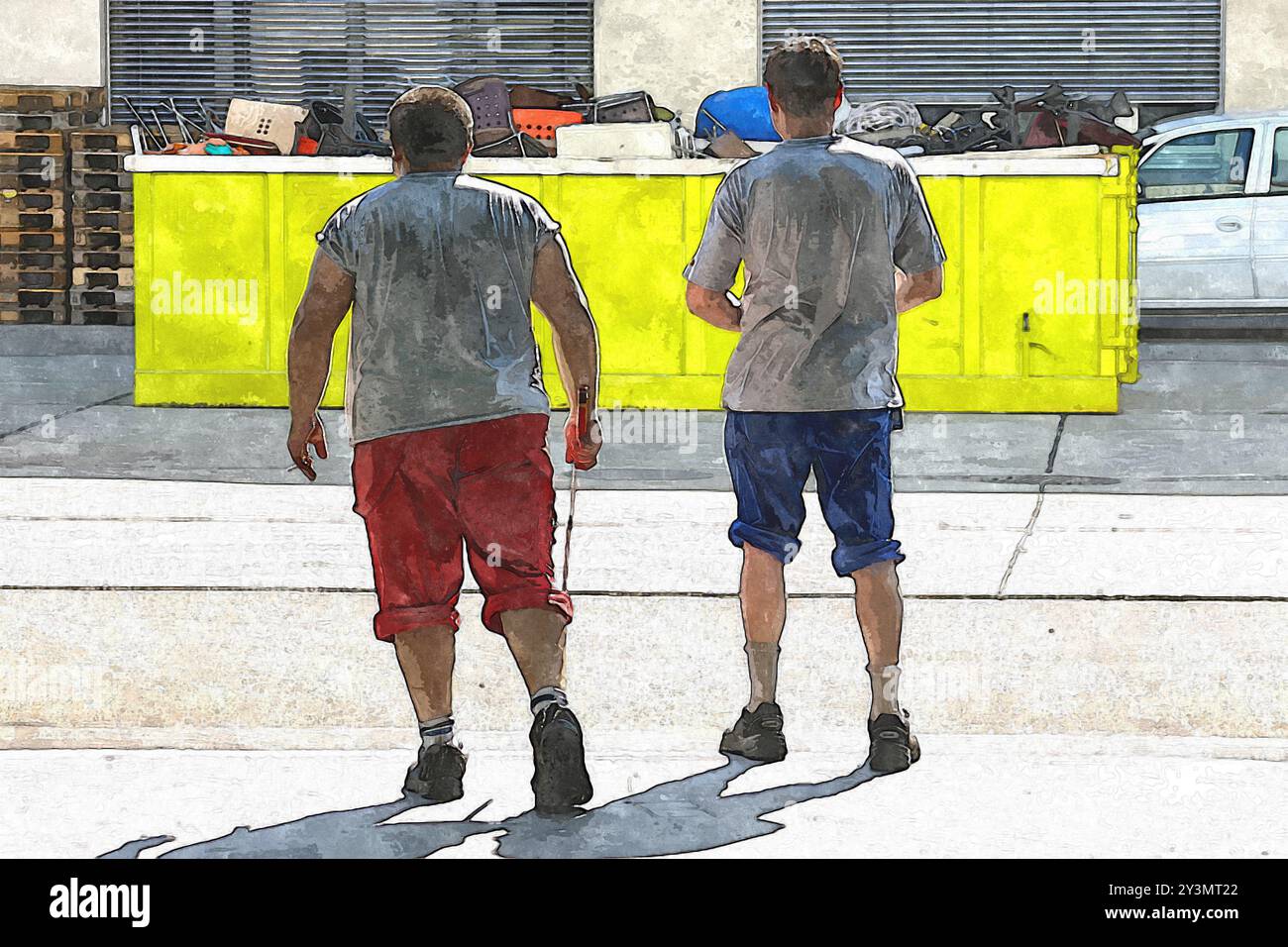 Two workers with rolled-up pants, drenched in sweat, walk out of a production hall, seen from behind. Stock Photo