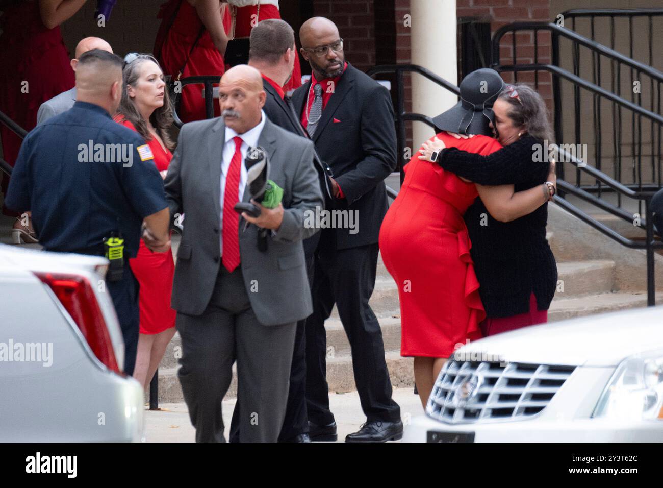Family members leave after the funeral of Apalachee High School