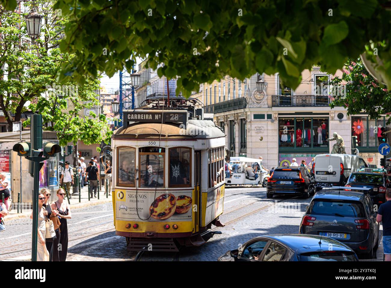 A tram along a street in Lisbon, Portugal Stock Photo