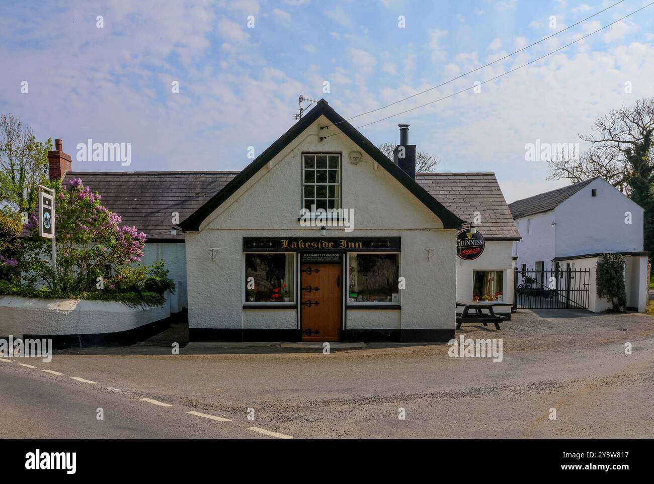 Exterior white-washed rural country public house County Down. The ...