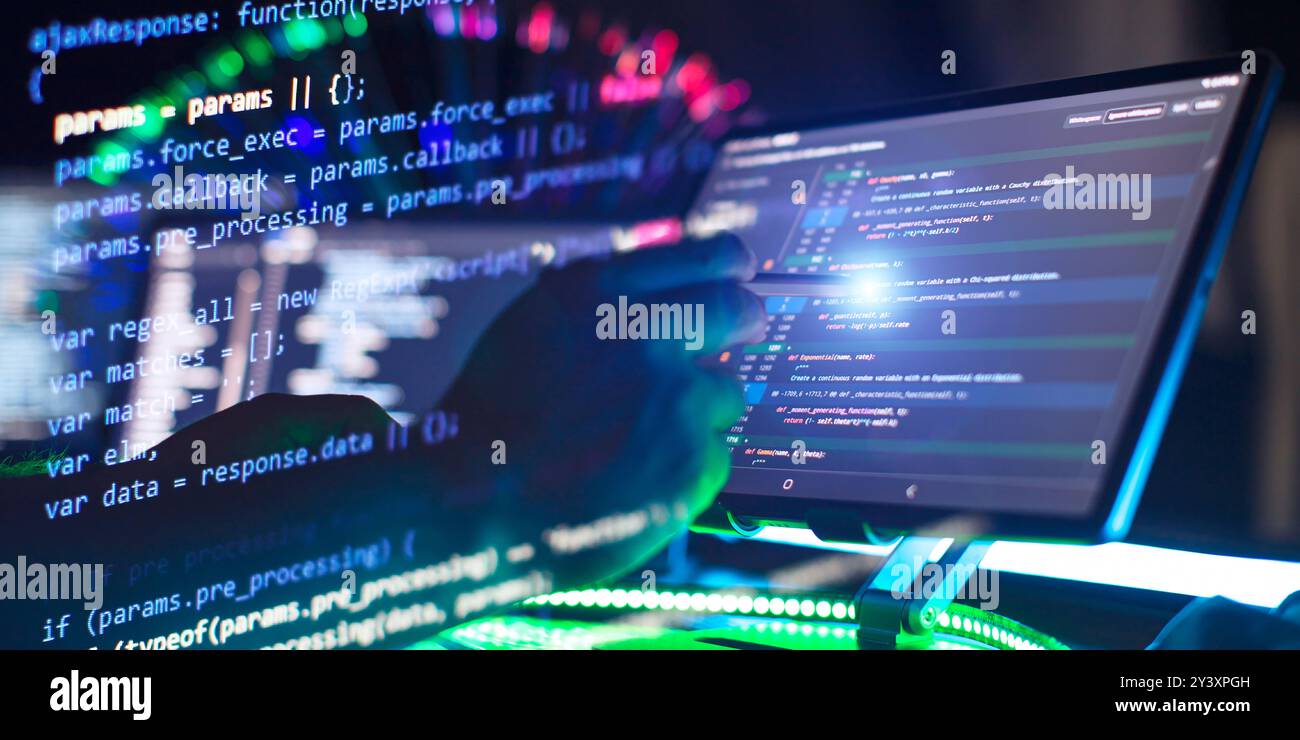 Work from home. Programmer coding code on notebook screen at Stock Photo