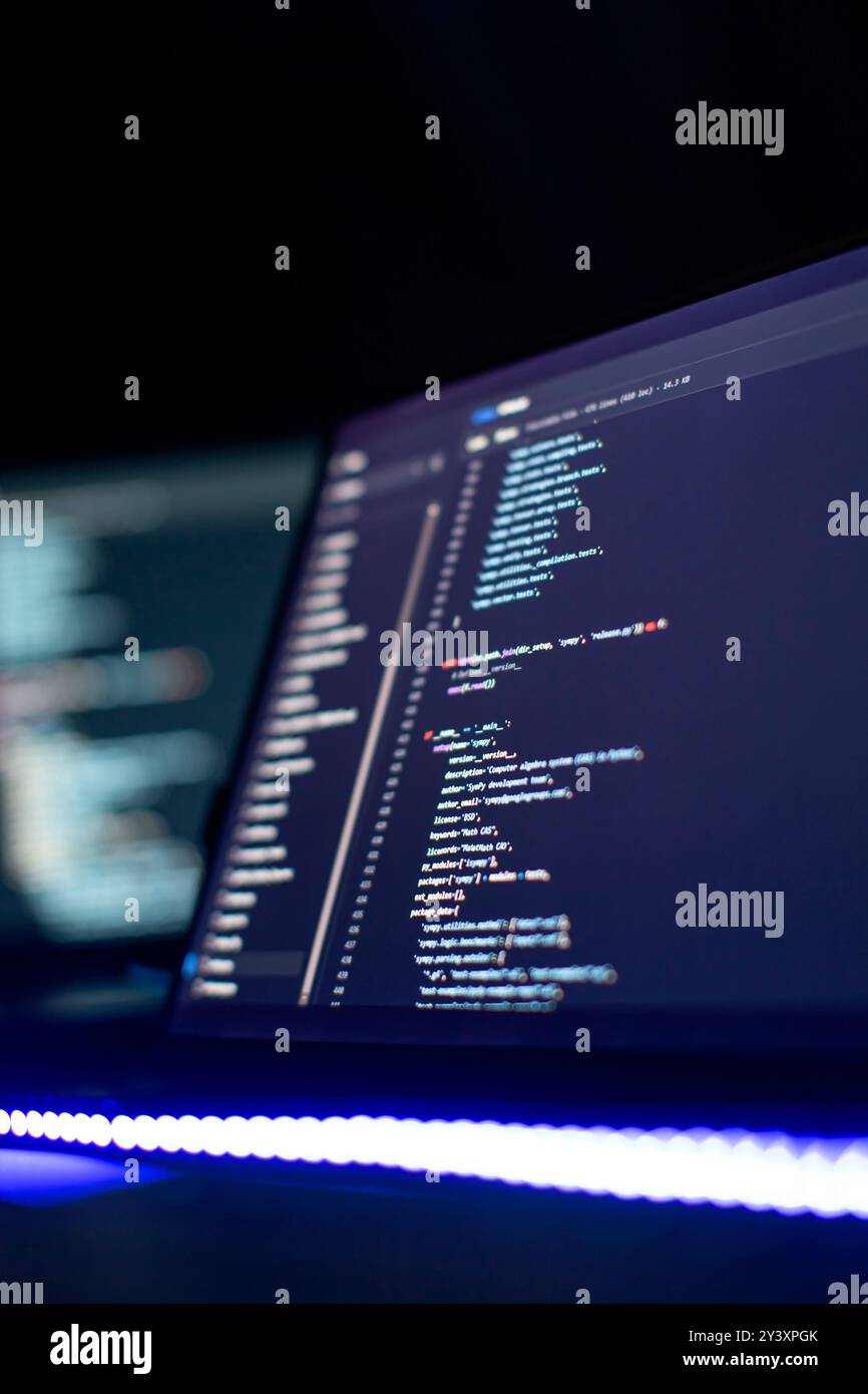 Modern tech. PHP syntax highlighted. Writing programming functions on laptop. Stock Photo