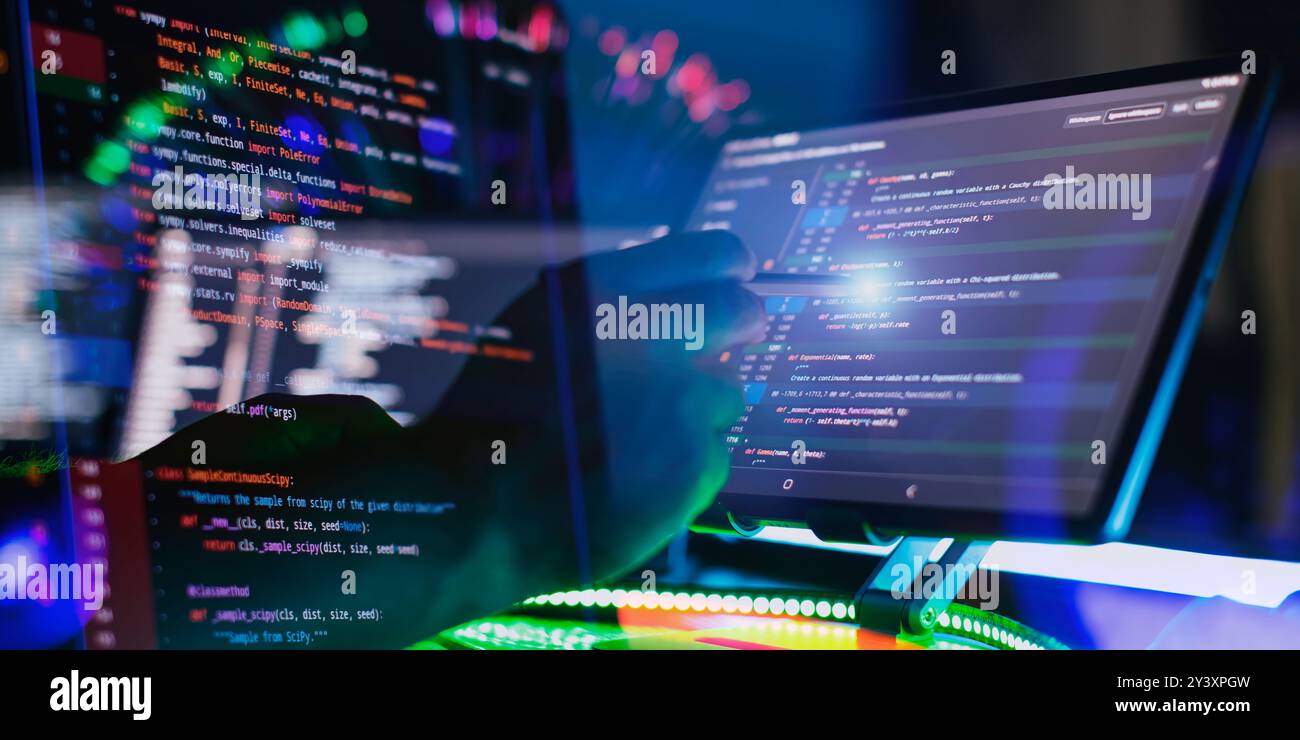 Work from home. Programmer coding code on notebook screen at Stock Photo