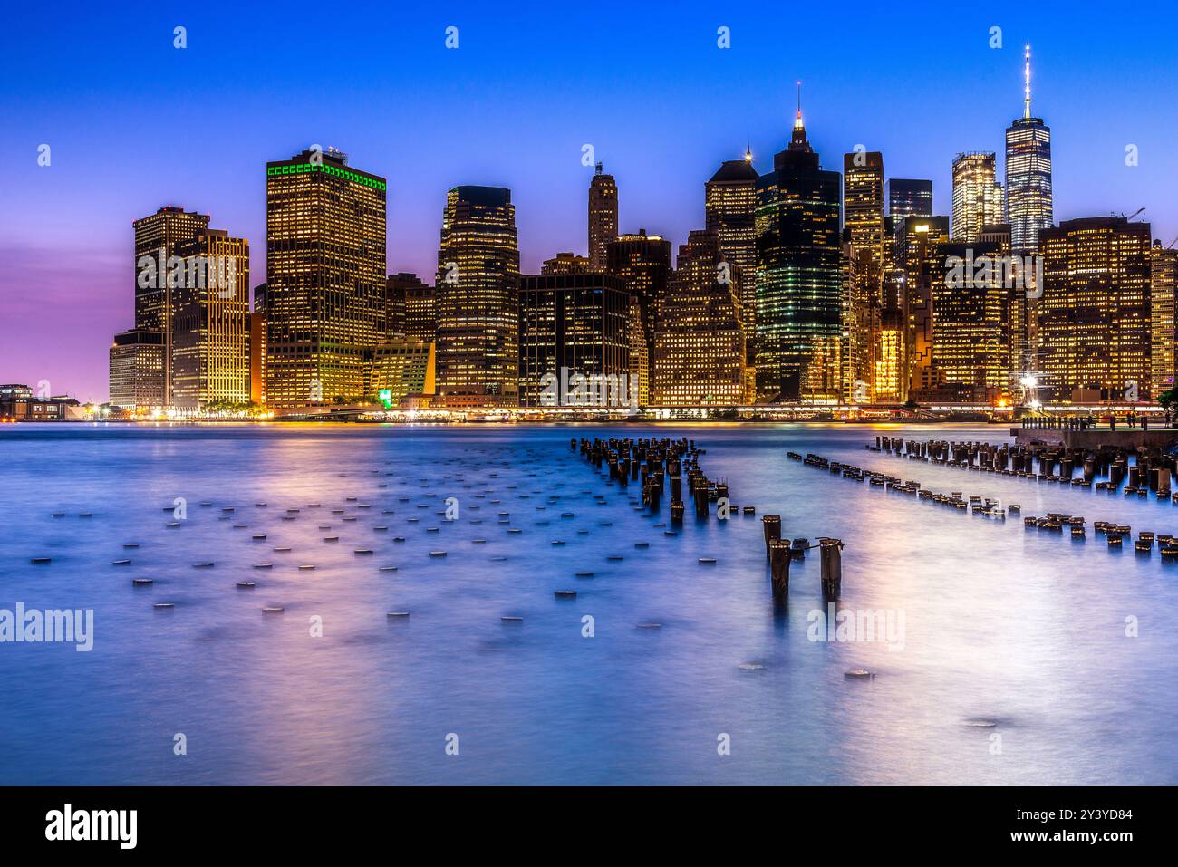 New York City Skyline at Night with East River Stock Photo