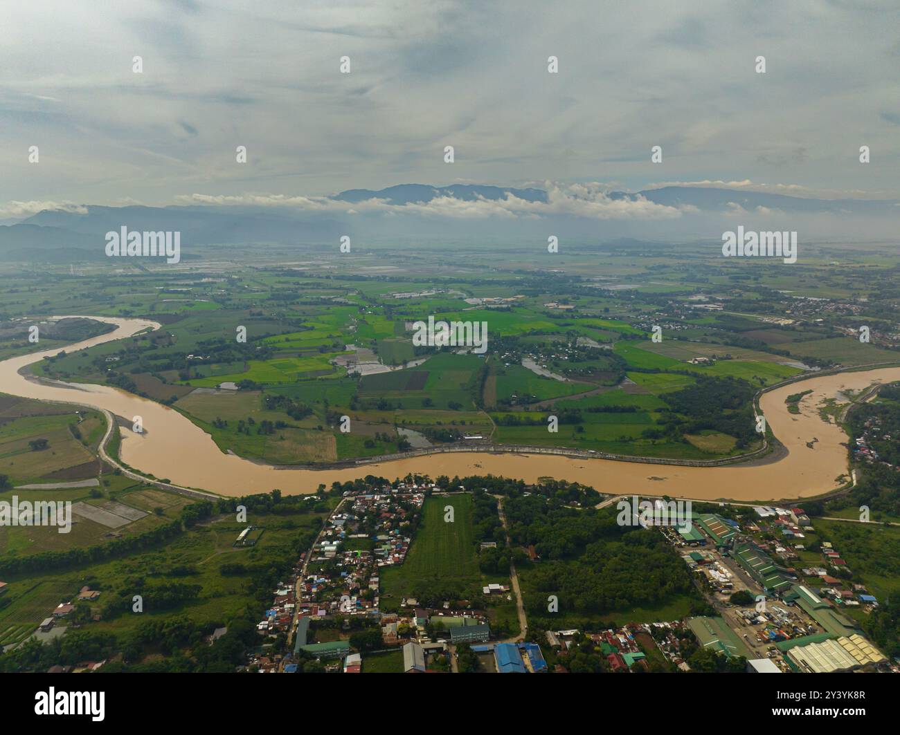 River along the agricultural land in Bukidnon, Philippines. Mindanao ...