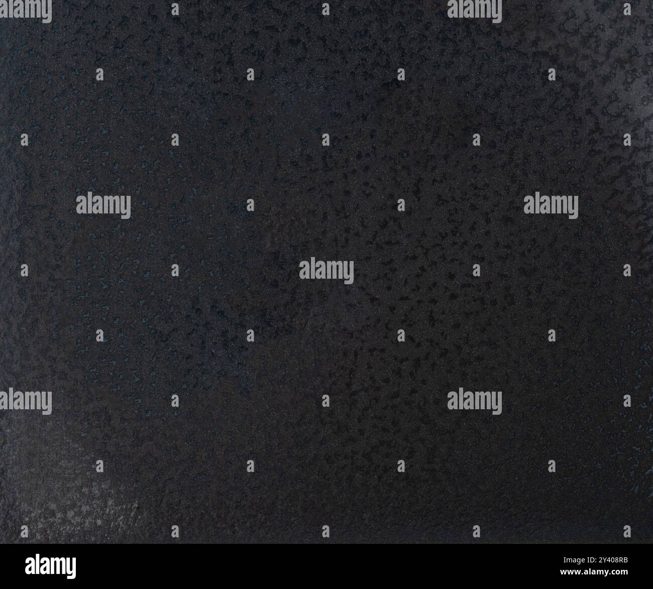 Pattern of black spotted plastic texture background close up view Stock Photo