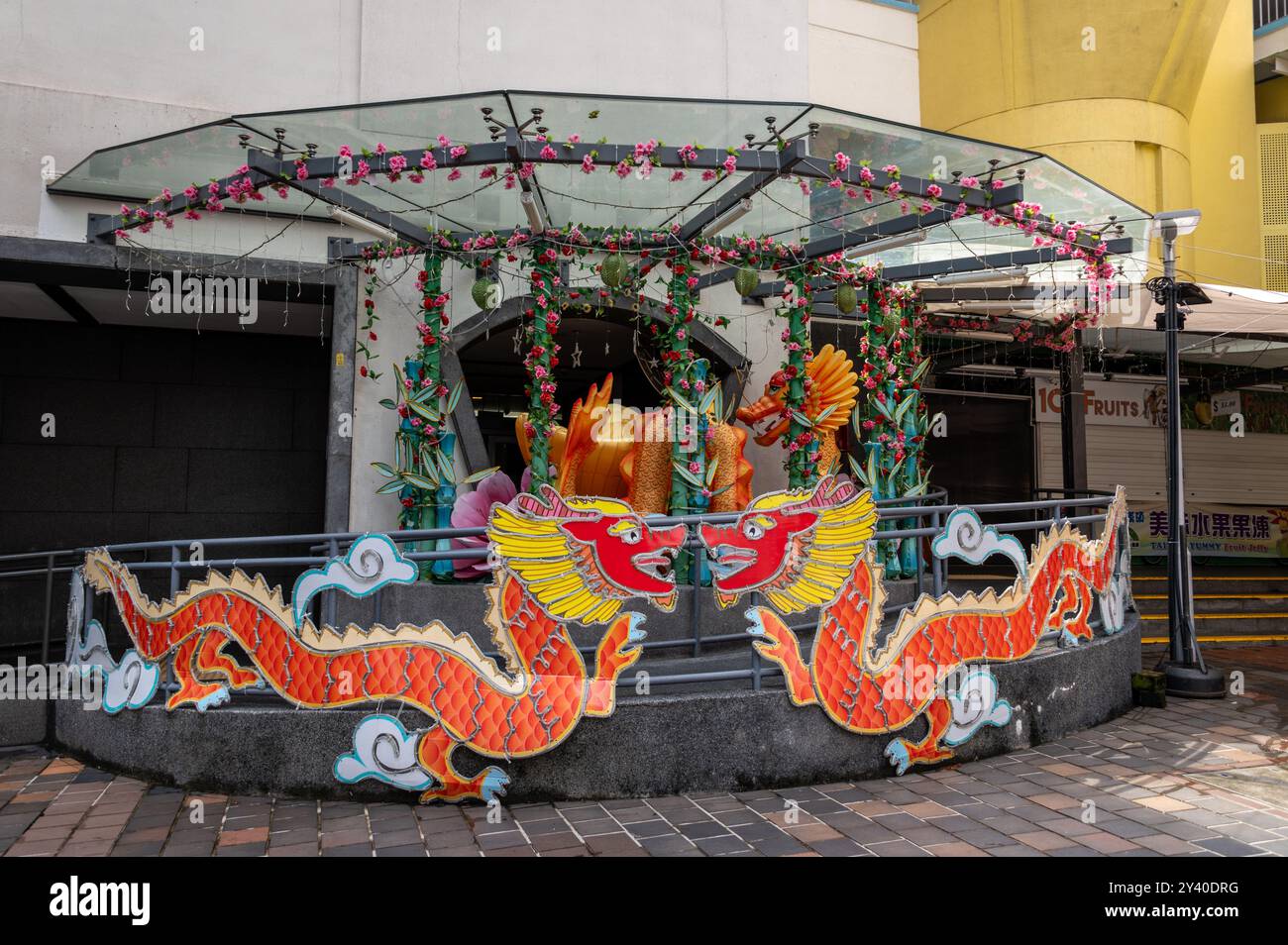 A Chinese decoration of two dragons at the Chinatown Complex , an indoor market and food hall in Chinatown, an old historic Chinese quarter in Singapore Stock Photo