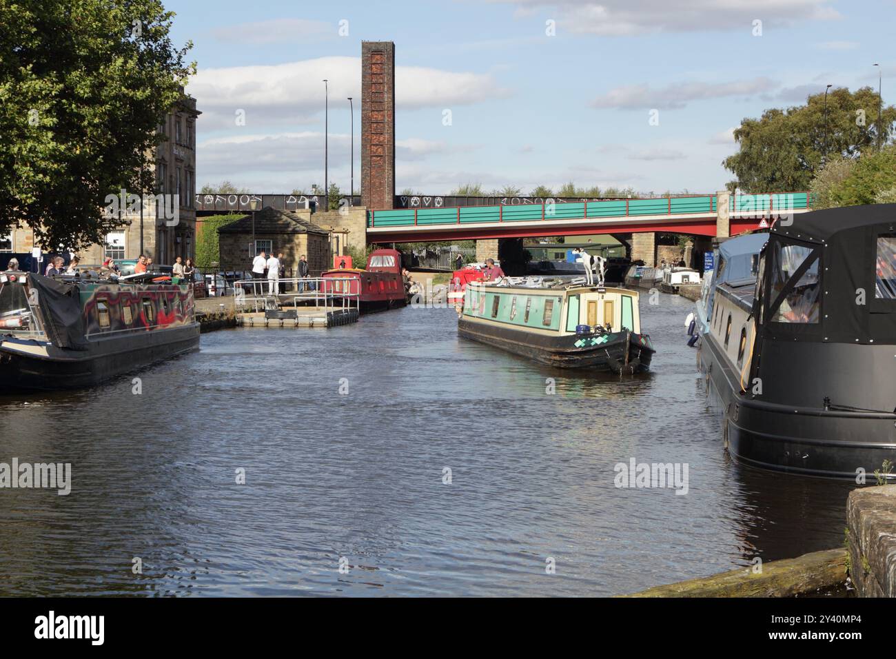 Canal narrow boats moored in Victoria Quays, urban Sheffield canal basin England UK, British waterways redevelopment waterway Stock Photo