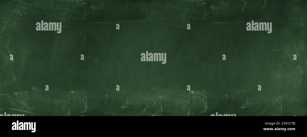 Chalk rubbed out on green chalkboard background Stock Photo