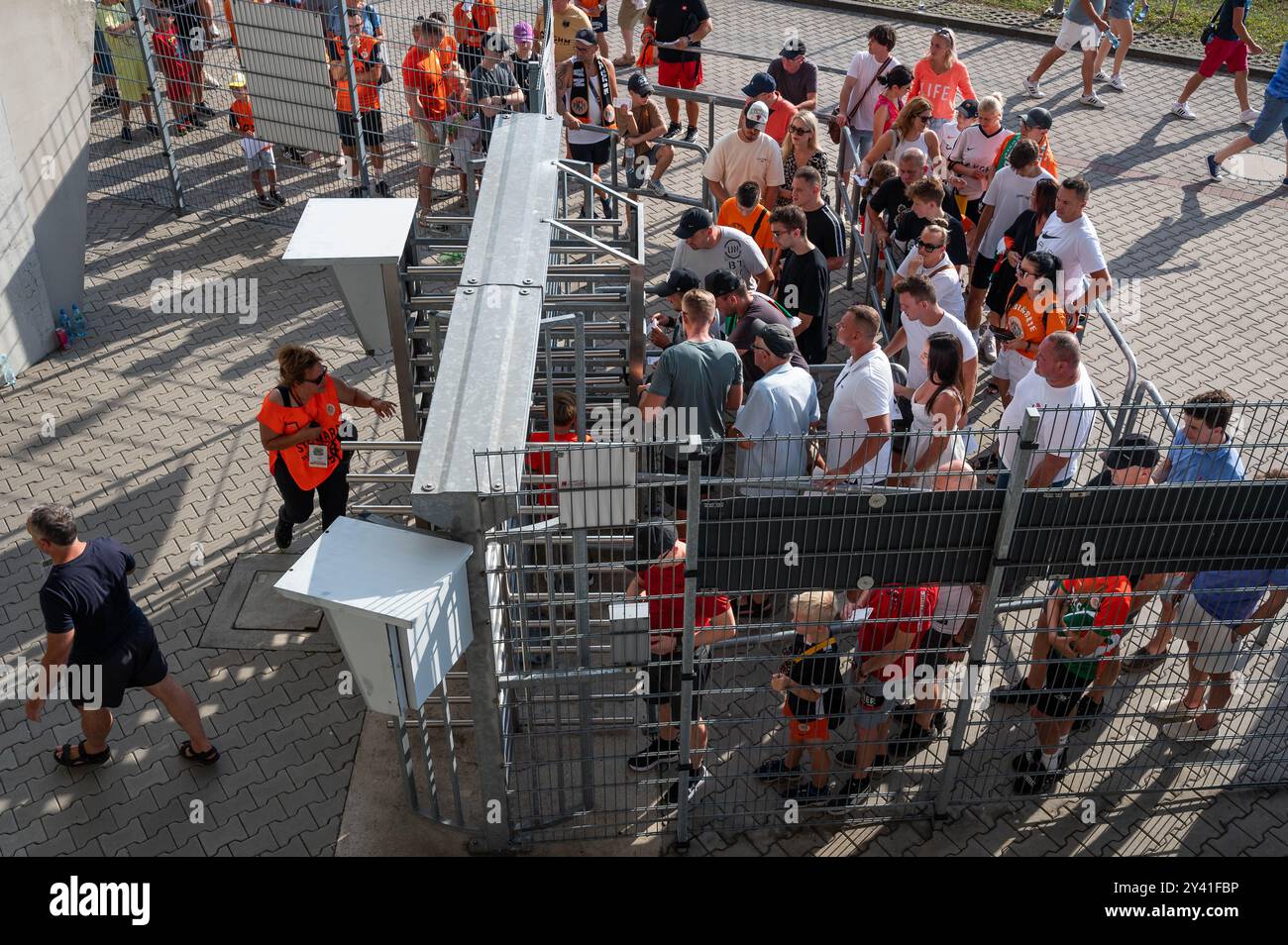 LUBIN, POLAND - AUGUST 17, 2024: Football match Polish PKO Ekstraklasa between KGHM Zaglebie Lubin vs Lech Poznan. Security and supporters at the entr Stock Photo