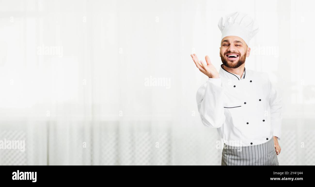 Chef Man Gesturing With Hand Approving Recipe Standing In Kitchen Stock Photo
