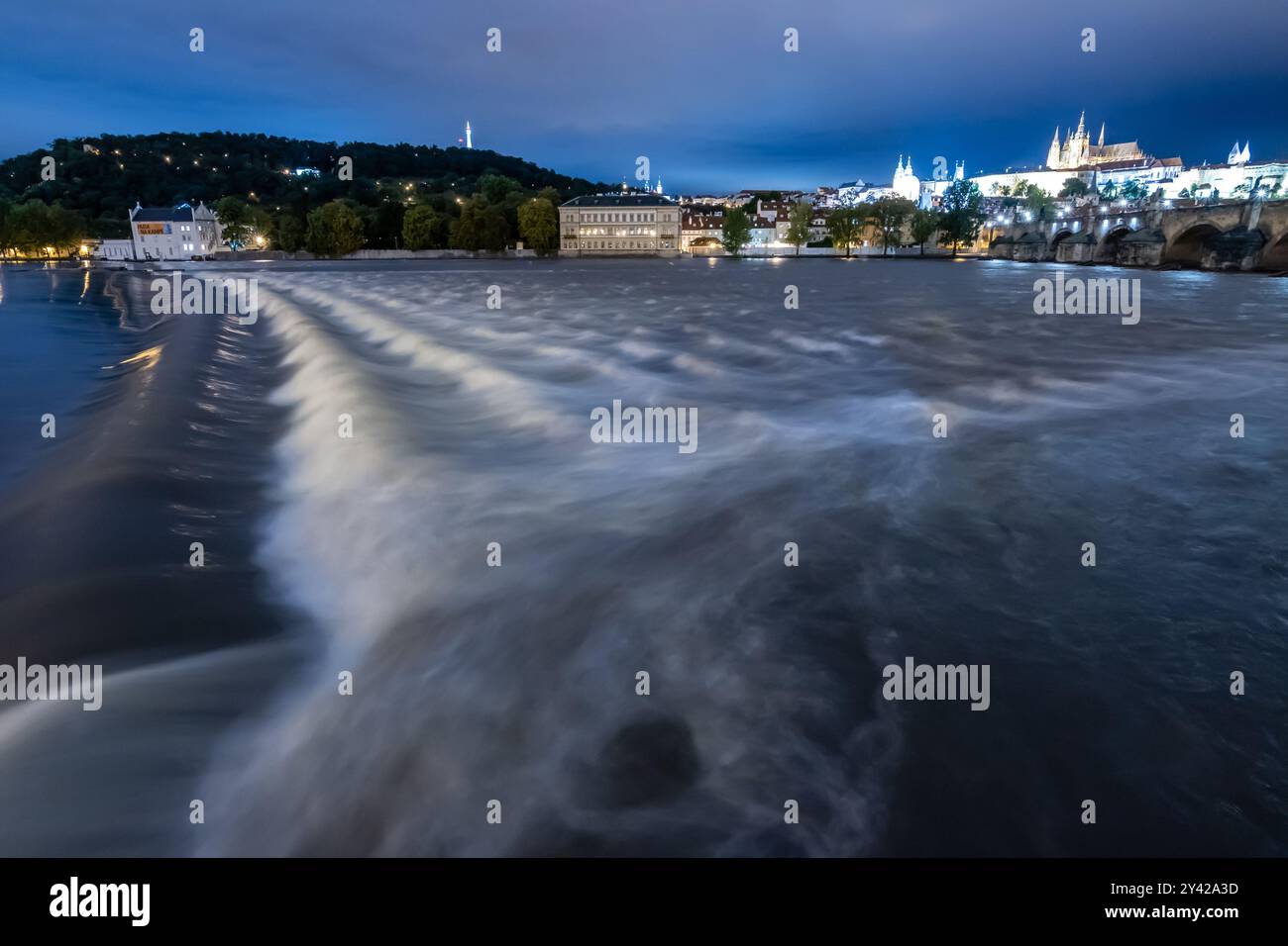 Prague, Czech Republic. 15th Sep, 2024. Waves seen at Vltava river during the rising water level in Prague with overview of historical part of the city including Prague Castle and Charles bridge. Heavy rains during the recent days have caused water levels to rise in Vltava river, which caused flood emergency warning. Floods caused by heavy rains have been battering region of central and eastern Europe, including Czech Republic, Poland, Austria, Slovakia and Romania since 13 September 2024. (Photo by Tomas Tkacik/SOPA Images/Sipa USA) Credit: Sipa USA/Alamy Live News Stock Photo