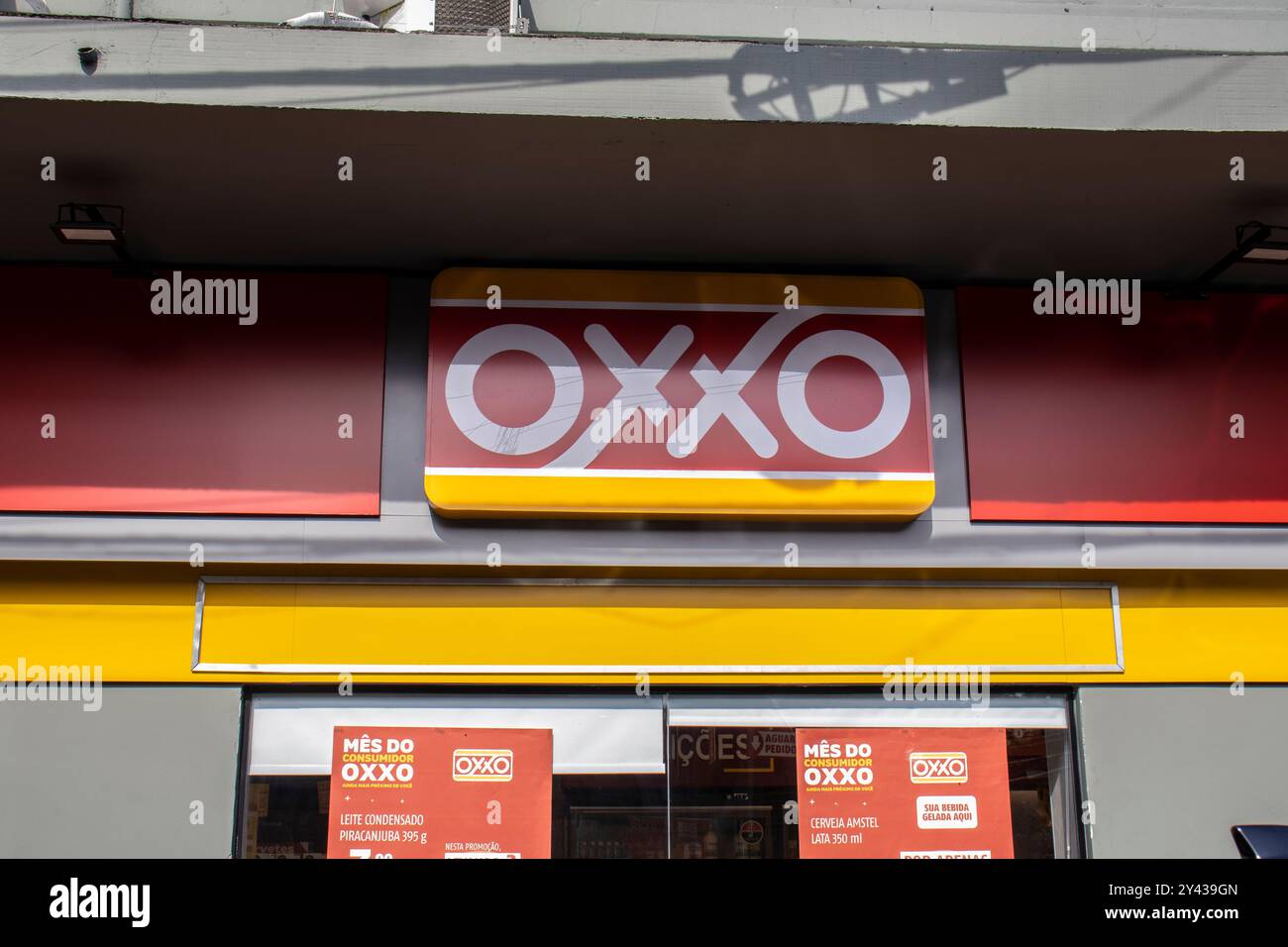 Sao Paulo, Brazil, March 15 2023. Front view of Oxxo supermarket in Sao Paulo city. Oxxo is popular Mexican chain of grocery stores or convenience sto Stock Photo