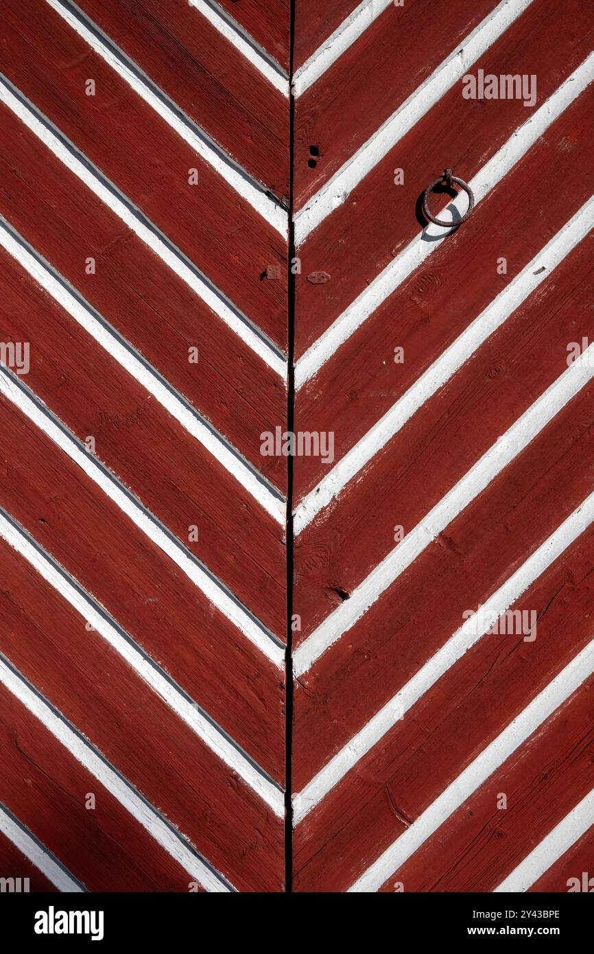 old door boards painted red and white, texture pattern background Stock Photo