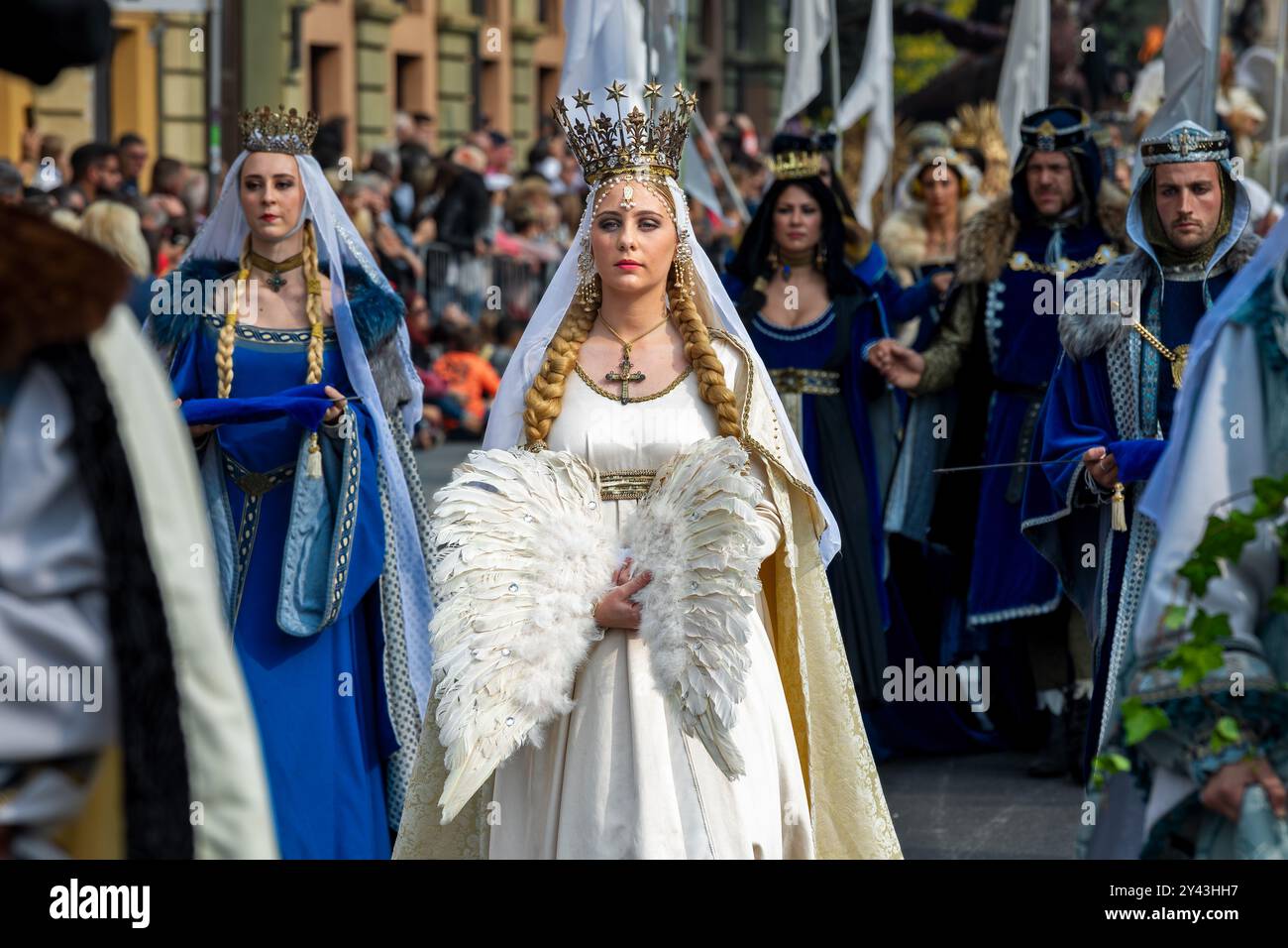 People dressed in medieval costumes during traditional historic parade ...